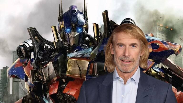Michael Bay Return for Transformers . still of Michael Bay with Optimus Prime from Transformers:Dark of the moon in Background