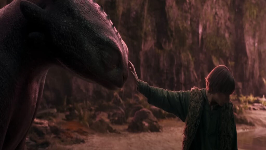 Hiccup gently reaches out to Toothless in a heartfelt moment