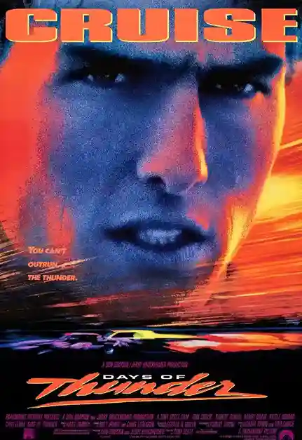 Scene from Days of Thunder (1990) featuring Cole Trickle racing a NASCAR stock car at high speed.