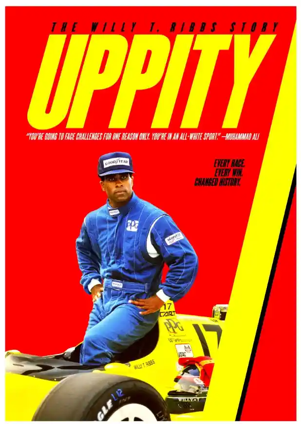 Scene from Uppity: The Willy T. Ribbs Story (2020) showing Willy T. Ribbs at a racetrack.